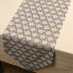 Woven Harmony Elegant Grey Cutwork Table Linen